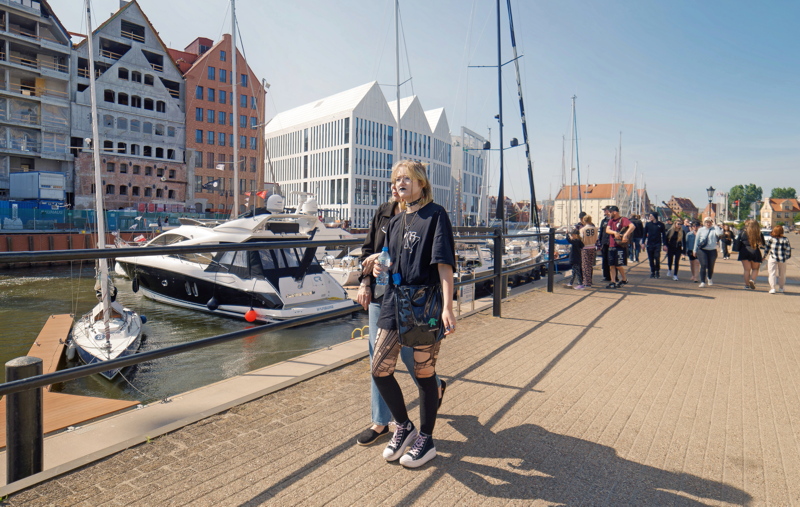 People walking on a Gdansk waterfront